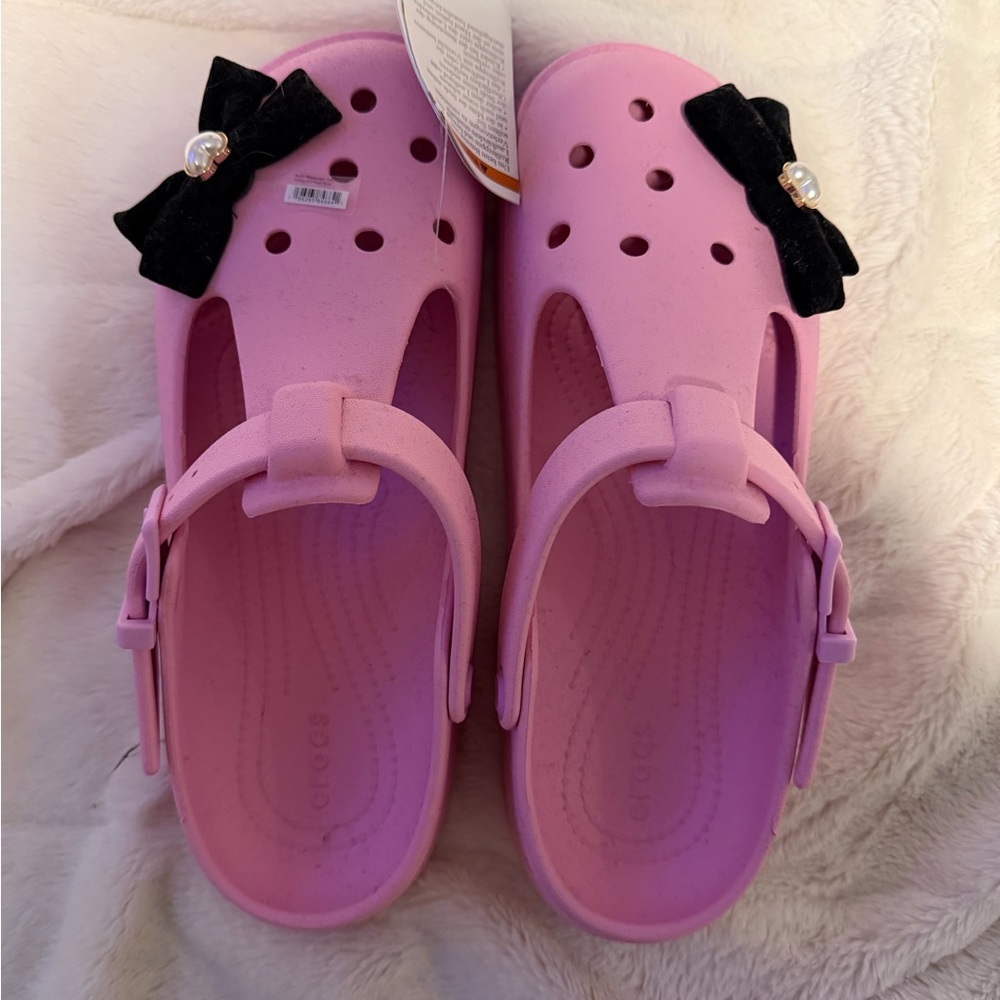 CROCS Pink Mary Janes with Black Bow Jibbitz